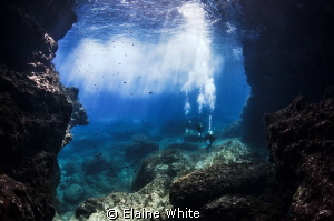 Exiting Comino caverns by Elaine White 